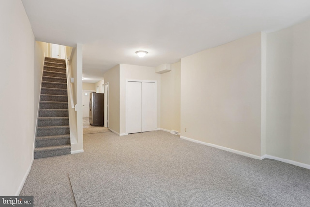 1018 W 7th St, Wilmington, DE 19805 - carpeted spare room featuring stairway and baseboards