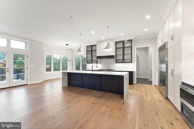 1554 Davidson Rd, Mclean, VA 22101 - kitchen featuring custom exhaust hood, stainless steel built in refrigerator, a sink, light countertops, and glass insert cabinets