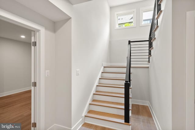 1554 Davidson Rd, Mclean, VA 22101 - staircase with wood finished floors and baseboards