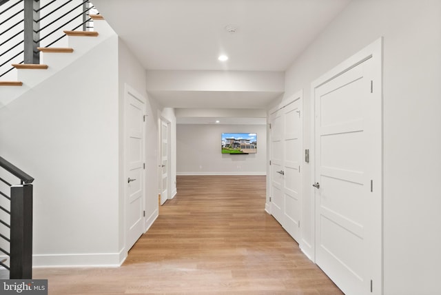 1554 Davidson Rd, Mclean, VA 22101 - hallway featuring stairs, baseboards, recessed lighting, and light wood-type flooring