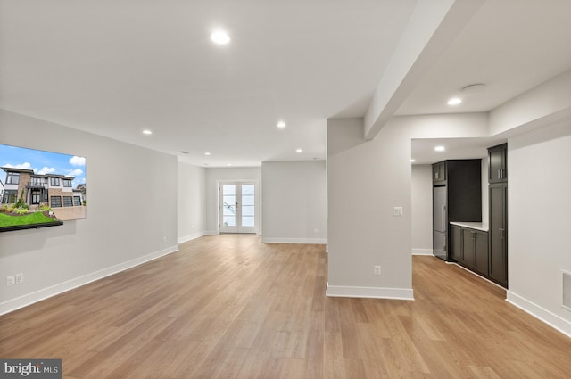 1554 Davidson Rd, Mclean, VA 22101 - unfurnished living room featuring light wood-style floors, recessed lighting, and baseboards