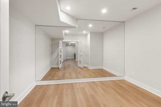 1554 Davidson Rd, Mclean, VA 22101 - below grade area with baseboards, wood finished floors, and recessed lighting
