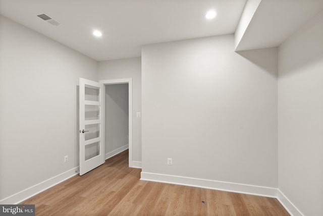 1554 Davidson Rd, Mclean, VA 22101 - empty room featuring light wood-style floors, baseboards, and recessed lighting