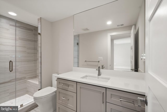 1554 Davidson Rd, Mclean, VA 22101 - full bathroom featuring toilet, vanity, a shower stall, and recessed lighting