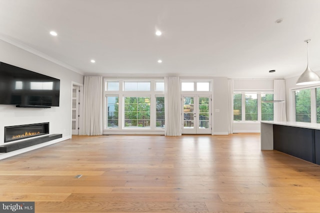 1554 Davidson Rd, Mclean, VA 22101 - unfurnished living room featuring crown molding, a glass covered fireplace, light wood-type flooring, recessed lighting, and baseboards