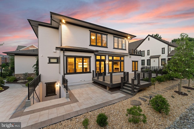 1554 Davidson Rd, Mclean, VA 22101 - rear view of house featuring a wooden deck and a patio area
