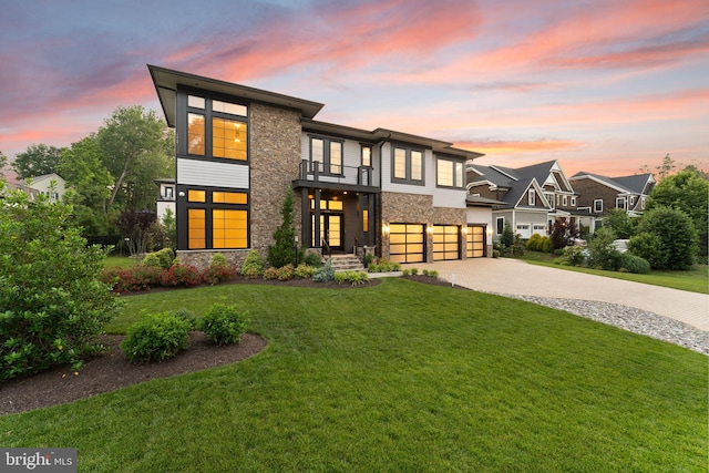 1554 Davidson Rd, Mclean, VA 22101 - contemporary home featuring stone siding, a balcony, a garage, driveway, and a yard
