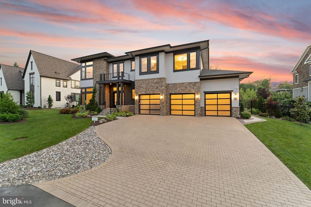 1554 Davidson Rd, Mclean, VA 22101 - contemporary home with a balcony, stone siding, decorative driveway, and an attached garage