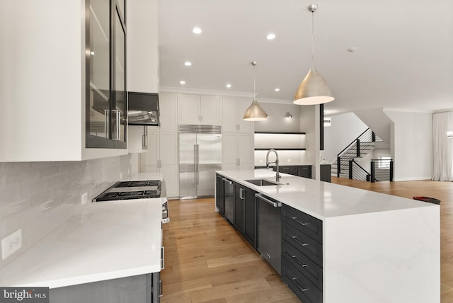 1554 Davidson Rd, Mclean, VA 22101 - kitchen featuring appliances with stainless steel finishes, a sink, white cabinetry, backsplash, and recessed lighting