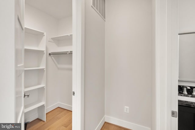 1554 Davidson Rd, Mclean, VA 22101 - spacious closet featuring light wood finished floors