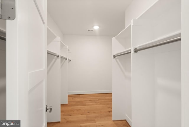 1554 Davidson Rd, Mclean, VA 22101 - walk in closet featuring light wood finished floors