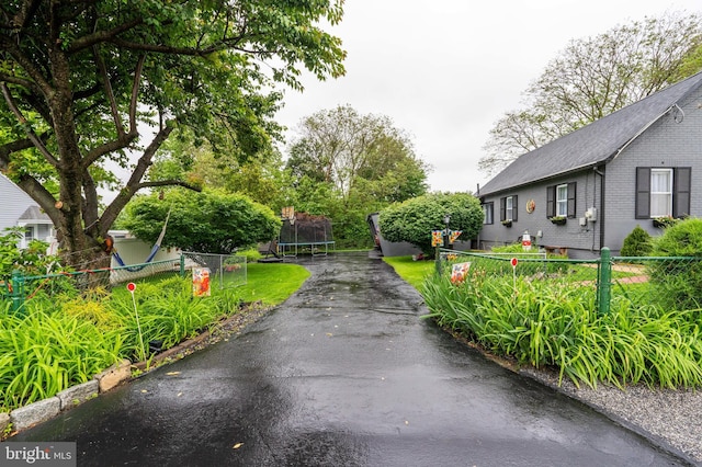 1332 Peach St, Upper Chichester, PA 19061 - view of yard featuring a trampoline