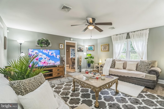 1332 Peach St, Upper Chichester, PA 19061 - living room with wood finished floors, ceiling fan, and baseboards