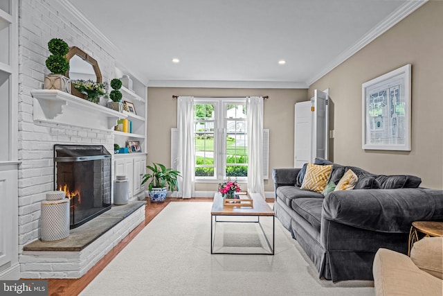 363 Colket Ln, Wayne, PA 19087 - living room with wood finished floors, crown molding, a fireplace, recessed lighting, and built in shelves
