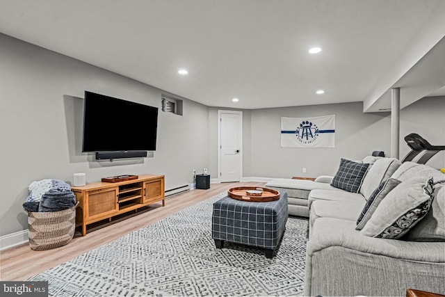 363 Colket Ln, Wayne, PA 19087 - living area with baseboard heating, light wood-type flooring, recessed lighting, and baseboards