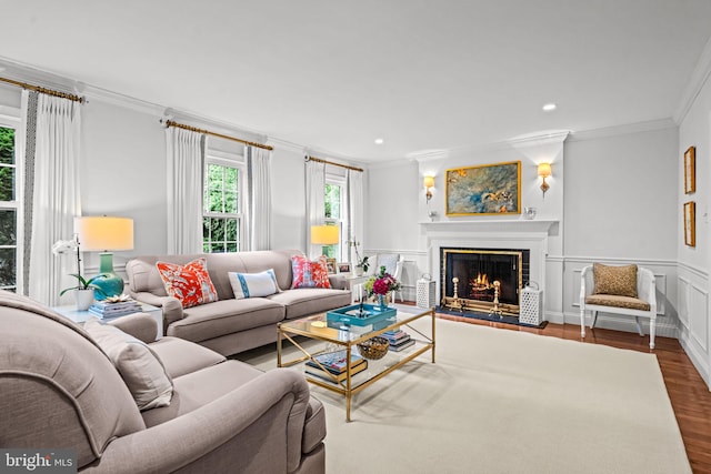 363 Colket Ln, Wayne, PA 19087 - living area with crown molding, wood finished floors, a lit fireplace, recessed lighting, and a wainscoted wall