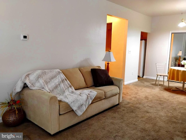 6527 Grange Ln Unit 202, Alexandria, VA 22315 - living room featuring baseboards and carpet