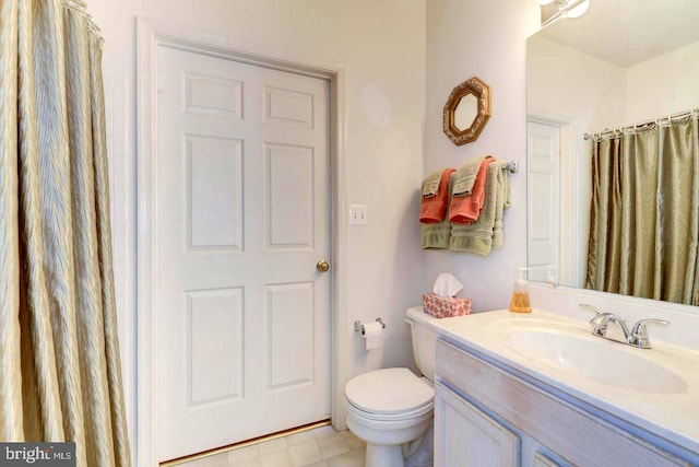 6527 Grange Ln Unit 202, Alexandria, VA 22315 - bathroom with vanity, toilet, and curtained shower