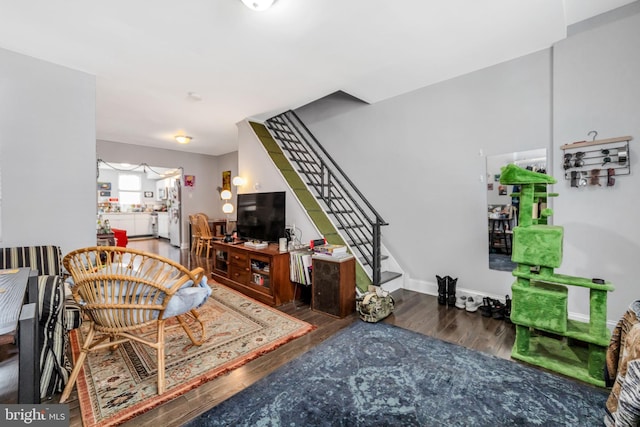 2112 Watkins St, Philadelphia, PA 19145 - living area with stairway and wood finished floors