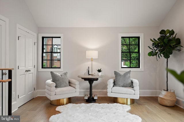 5376 28th St NW, Washington, DC 20015 - sitting room featuring wood finished floors, vaulted ceiling, and baseboards