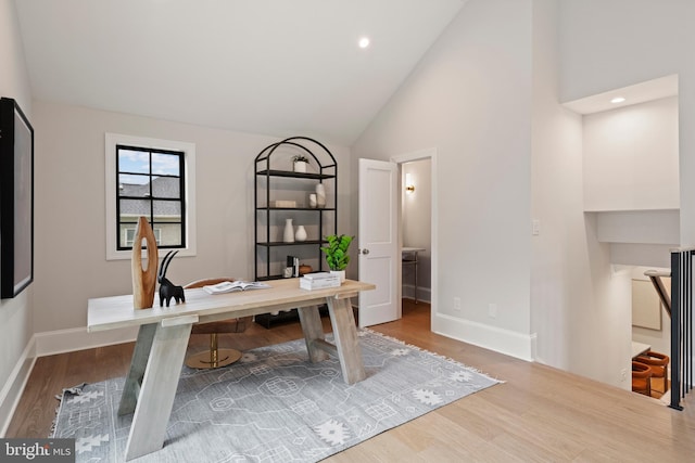 5376 28th St NW, Washington, DC 20015 - office featuring wood finished floors, baseboards, and high vaulted ceiling