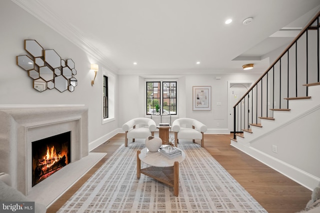5376 28th St NW, Washington, DC 20015 - living room with crown molding, wood finished floors, baseboards, and recessed lighting