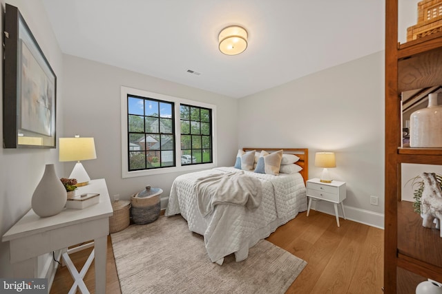 5376 28th St NW, Washington, DC 20015 - bedroom featuring light wood-style floors and baseboards