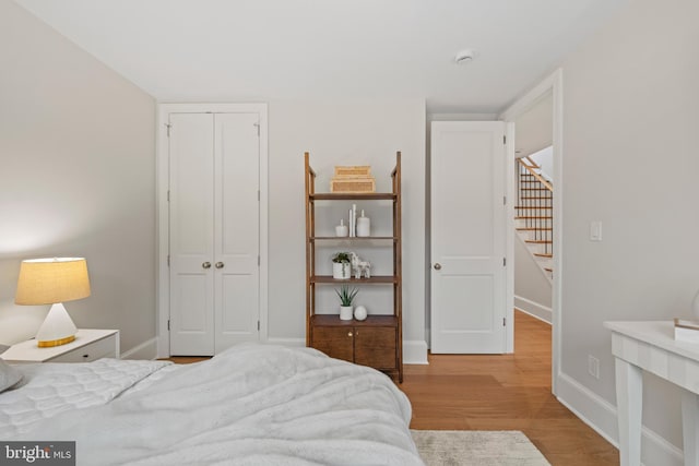 5376 28th St NW, Washington, DC 20015 - bedroom featuring wood finished floors, baseboards, and a closet