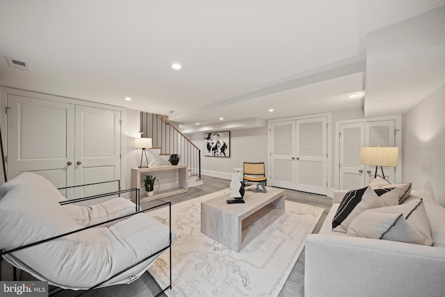 5376 28th St NW, Washington, DC 20015 - living area featuring stairs, recessed lighting, light wood finished floors, and baseboards