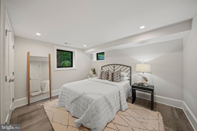 5376 28th St NW, Washington, DC 20015 - bedroom with baseboards, wood finished floors, and recessed lighting