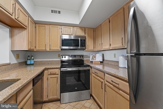 2400 Clarendon Blvd Unit 1015, Arlington, VA 22201 - kitchen with appliances with stainless steel finishes, light stone counters, and light tile patterned floors