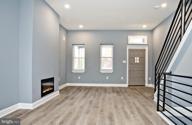 3137 Clifford St, Philadelphia, PA 19121 - entryway featuring light wood-style floors, baseboards, recessed lighting, and stairs