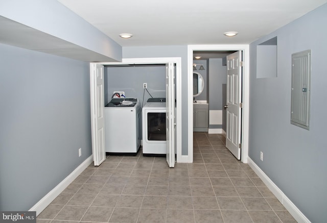 3137 Clifford St, Philadelphia, PA 19121 - laundry area featuring electric panel, light tile patterned floors, baseboards, independent washer and dryer, and recessed lighting