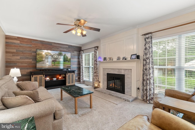 9341 Amaryllis Ave, Manassas, VA 20110 - living area with a brick fireplace, ornamental molding, ceiling fan, and carpet flooring