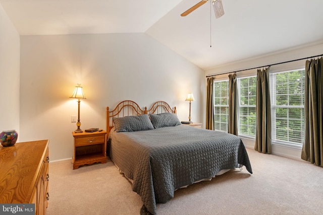 9341 Amaryllis Ave, Manassas, VA 20110 - bedroom featuring light colored carpet, lofted ceiling, a ceiling fan, and baseboards