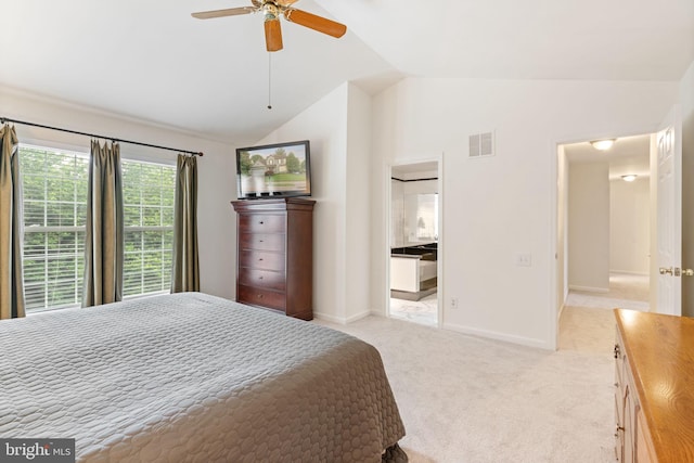 9341 Amaryllis Ave, Manassas, VA 20110 - bedroom featuring vaulted ceiling, light carpet, baseboards, a ceiling fan, and connected bathroom