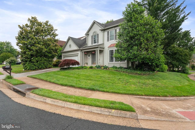 9341 Amaryllis Ave, Manassas, VA 20110 - traditional-style home featuring a front yard, an attached garage, and driveway
