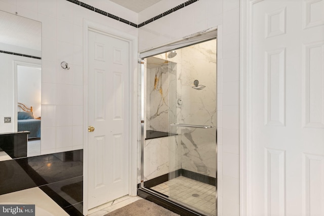 9341 Amaryllis Ave, Manassas, VA 20110 - ensuite bathroom featuring a marble finish shower