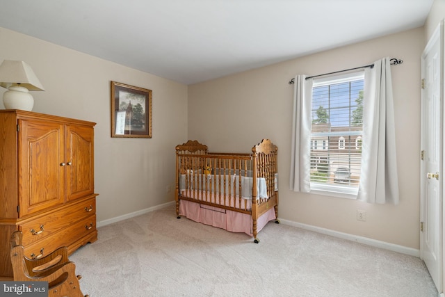 9341 Amaryllis Ave, Manassas, VA 20110 - bedroom with light colored carpet and baseboards