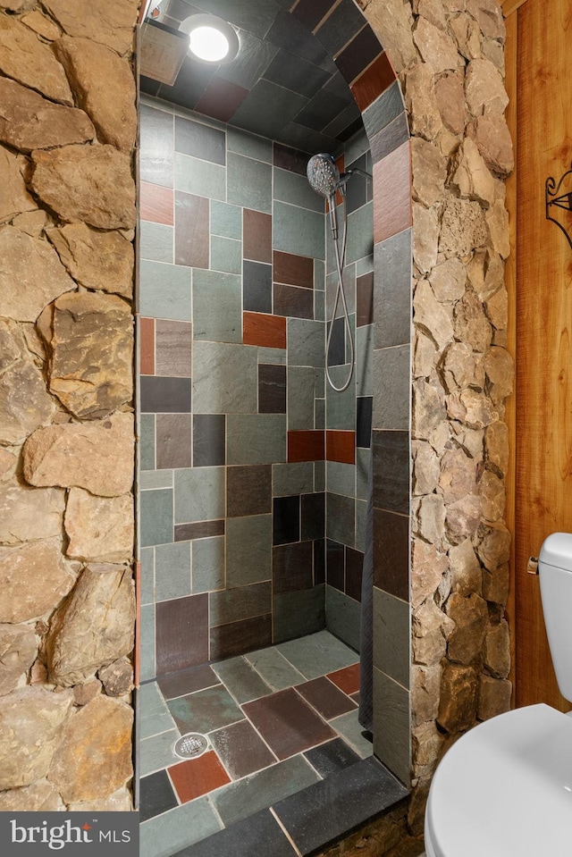 9341 Amaryllis Ave, Manassas, VA 20110 - bathroom featuring a tile shower and toilet