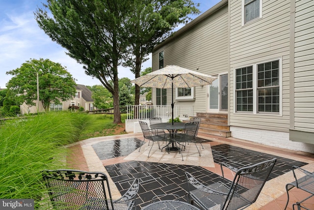 9341 Amaryllis Ave, Manassas, VA 20110 - view of patio / terrace featuring entry steps and outdoor dining space