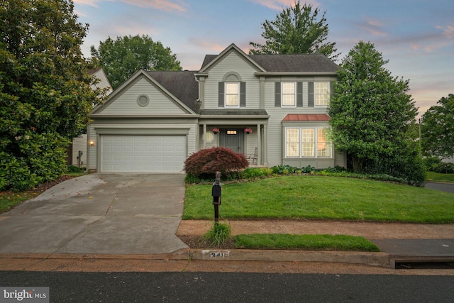 9341 Amaryllis Ave, Manassas, VA 20110 - traditional-style home with an attached garage, concrete driveway, a front lawn, and a shingled roof