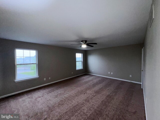 101 Abbey Ln, Telford, PA 18969 - unfurnished room with ceiling fan, baseboards, and dark colored carpet