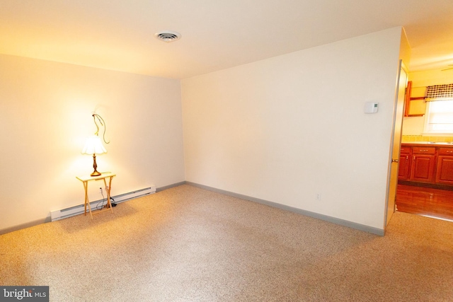 503 Deer Run Rd, Lititz, PA 17543 - spare room with baseboard heating, carpet flooring, and baseboards