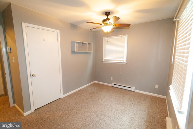 503 Deer Run Rd, Lititz, PA 17543 - unfurnished bedroom featuring baseboard heating, multiple windows, light carpet, and baseboards