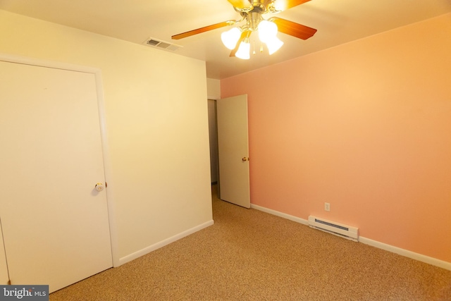 503 Deer Run Rd, Lititz, PA 17543 - unfurnished bedroom with a baseboard heating unit, light colored carpet, baseboards, and a ceiling fan