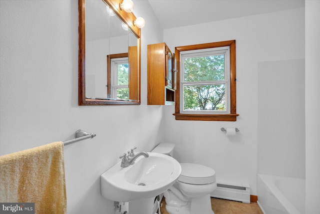 176 Morris Ave, Sewell, NJ 08080 - full bathroom featuring a baseboard radiator, a sink, a bath, toilet, and tile patterned floors