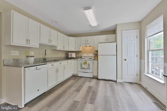 35871 Devon Park Sq, Round Hill, VA 20141 - kitchen with white appliances, a sink, under cabinet range hood, and plenty of natural light