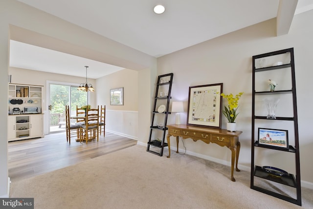 35871 Devon Park Sq, Round Hill, VA 20141 - carpeted dining space featuring a chandelier and baseboards