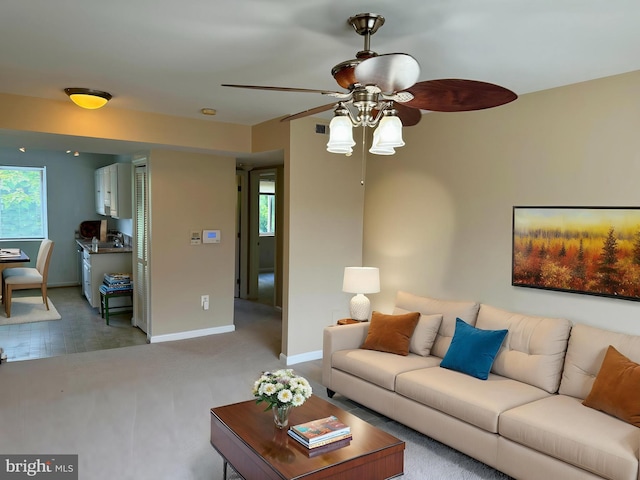 4212 Benning Rd NE Unit 6, Washington, DC 20019 - living area featuring a ceiling fan, baseboards, and healthy amount of natural light